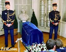 The coffin of Alexandre Dumas is displayed at a chateau in Marly le Roi, west of Paris before the reburial. It is covered with blue velvet inscribed 'Tous pour un, un pour tous' [all for one, one for all].  © Copyright 2002 The Associated Press